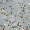 Pastel blue floral bird mural wallpaper with blooming branches, lemons, and elegant birds, luxury botanical wall design for classic bedroom or living space.