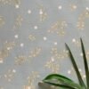 Premium sage green non-woven wallpaper with elegant gold botanical vines and delicate white floral pattern, perfect for living rooms, bedrooms, feature walls, nurseries, and luxury home interiors.