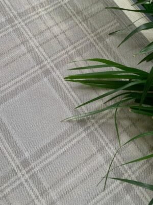 Grey beige textured plaid wallpaper with subtle diagonal check pattern for modern living room interiors by RUBY The Furnishing Studio.