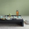 Luxury sage green vertical textured wallpaper with subtle linear fabric effect, Armani Casa inspired modern designer wallcovering for living room and bedroom interiors.